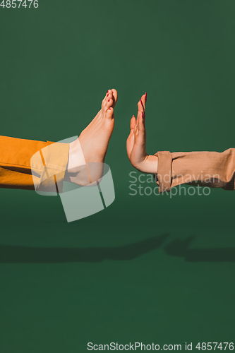 Image of Bright fashionable hand and leg working up daily things together. Modern artwork, contemporary art