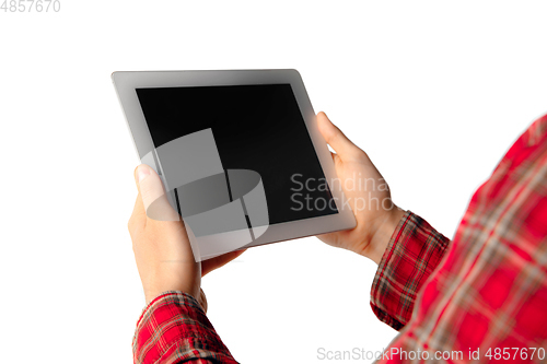 Image of Close up of man using tablet with blank screen isolated on white studio background