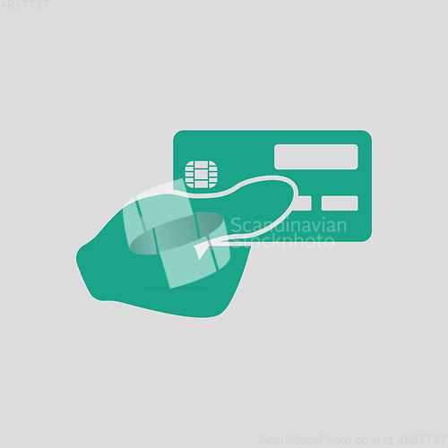 Image of Hand holding credit card icon