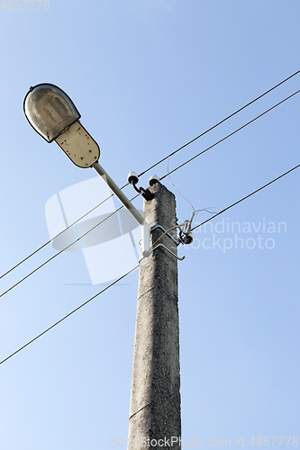 Image of Electric lines, blue sky