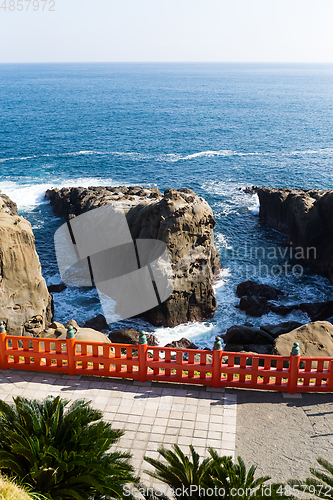 Image of Aoshima Shrine and coastline with blue sky