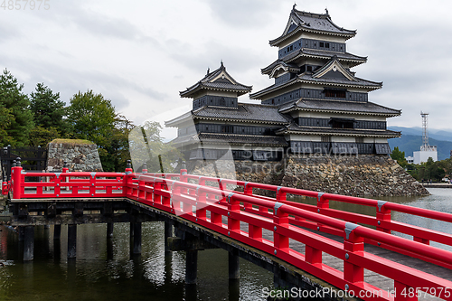 Image of Matsumoto castle and red bridge