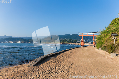 Image of Aoshima Island and japanese torii with sunshine