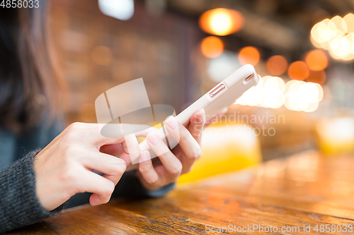 Image of Woman use of mobile phone