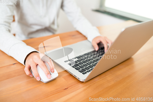 Image of Woman using laptop computer