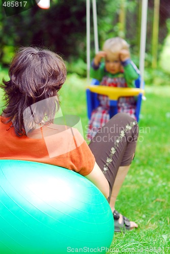 Image of A girl with her mammy