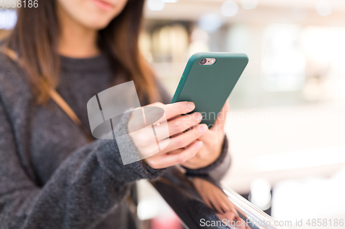 Image of Young Woman using cellphone