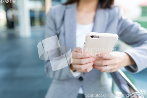 Image of Businesswoman use of cellphone