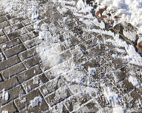 Image of Snow on the sidewalk