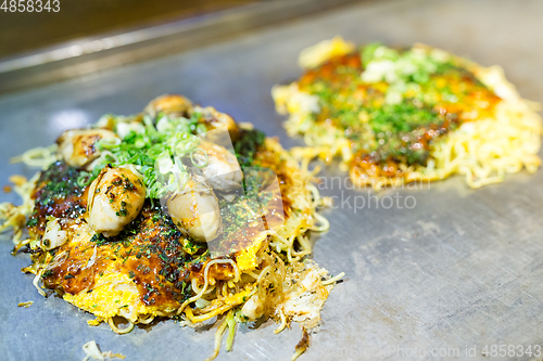 Image of Okonomiyaki Japanese hot plate pizza