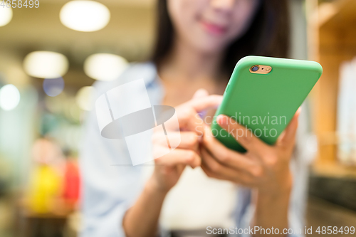 Image of Woman using cellphone