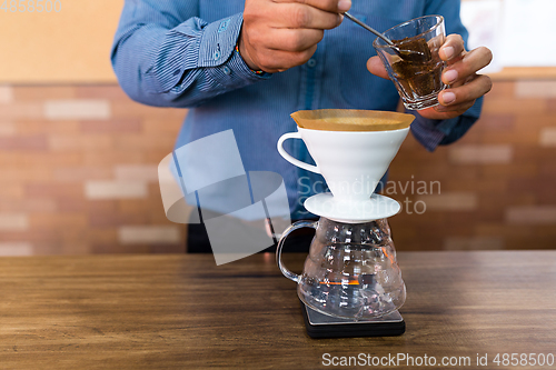 Image of Barista making of hand drip coffee