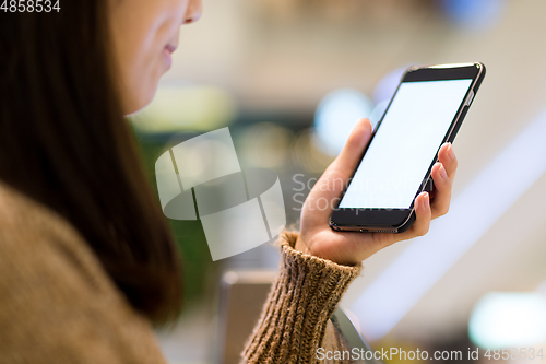 Image of Woman use of mobile phone