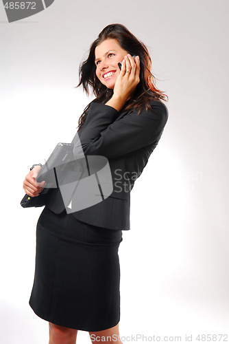 Image of A woman with the folder and mobile phone