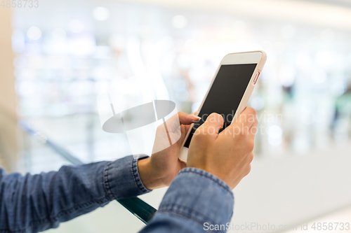 Image of Hand touch on cellphone