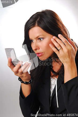 Image of A woman during the making-up