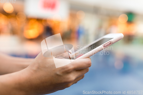 Image of Woman using cellphone