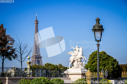 Image of Marble statue and Eiffel Tower view from the Tuileries Garden, P