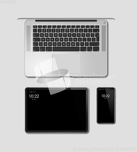 Image of Laptop, tablet and phone set mockup isolated on grey. 3D render