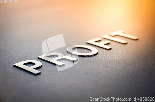 Image of Word profit written with white solid letters