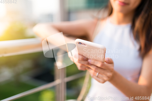 Image of Woman using cellphone