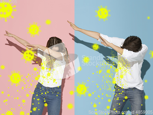 Image of How to sneezing right - caucasian couple dabbing, stop epidemic