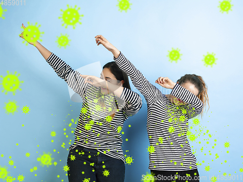 Image of How to sneezing right - caucasian women dabbing, stop epidemic