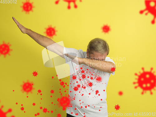Image of How to sneezing right - caucasian senior man dabbing, stop epidemic