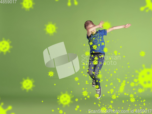 Image of How to sneezing right - caucasian boy dabbing in jump, stop epidemic