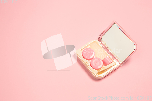 Image of Soft and feminine. Monochrome stylish composition in pink color. Top view, flat lay.