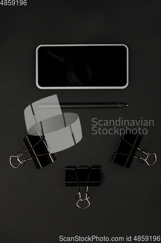 Image of Office things. Monochrome stylish composition in black color. Top view, flat lay.