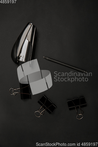 Image of Office things. Monochrome stylish composition in black color. Top view, flat lay.