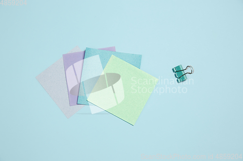 Image of Sticker papers. Monochrome stylish composition in blue color. Top view, flat lay.
