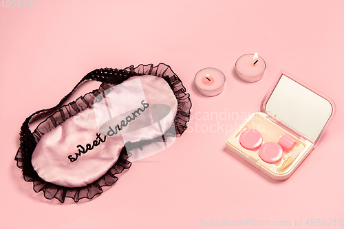 Image of Soft and feminine. Monochrome stylish composition in pink color. Top view, flat lay.