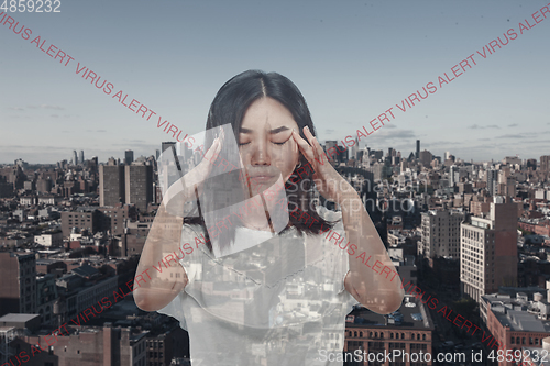 Image of Stressed woman holding head with hands on abstract city background. Double exposure. Virus alert, coronavirus pandemic.