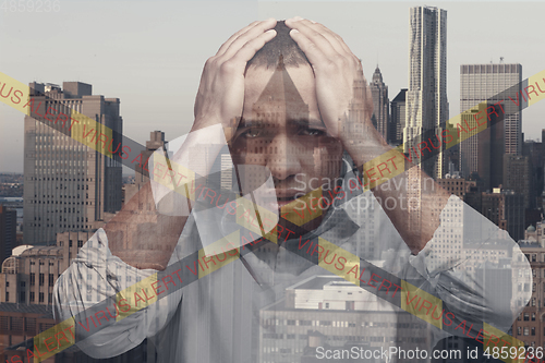 Image of Stressed man holding head with hands on abstract city background. Double exposure. Virus alert, coronavirus pandemic.