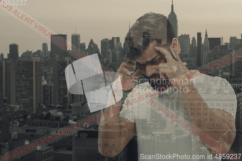 Image of Stressed man holding head with hands on abstract city background. Double exposure. Virus alert, coronavirus pandemic.