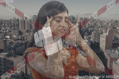 Image of Stressed woman holding head with hands on abstract city background. Double exposure. Virus alert, coronavirus pandemic.