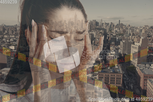 Image of Stressed woman holding head with hands on abstract city background. Double exposure. Virus alert, coronavirus pandemic.