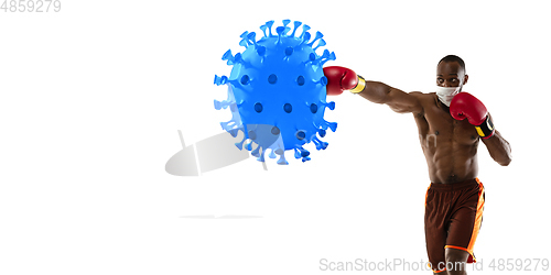 Image of Sportsman kicking, punching coronavirus, protection and treatment concept, flyer