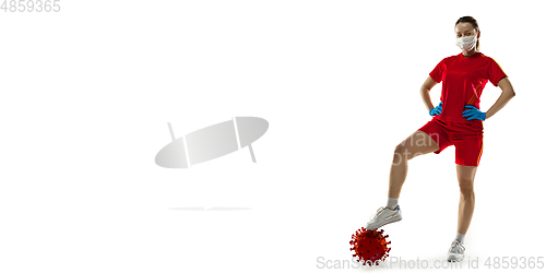 Image of Sportswoman kicking, punching coronavirus, protection and treatment concept, flyer