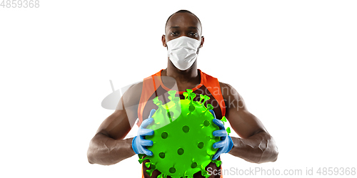 Image of Sportsman kicking, punching coronavirus, protection and treatment concept, flyer