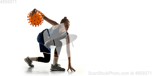 Image of Sportswoman kicking, punching coronavirus, protection and treatment concept, flyer