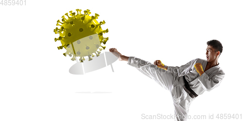 Image of Sportsman kicking, punching coronavirus, protection and treatment concept, flyer