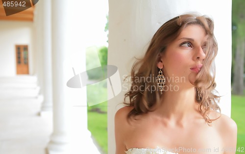 Image of beautiful girl and wind