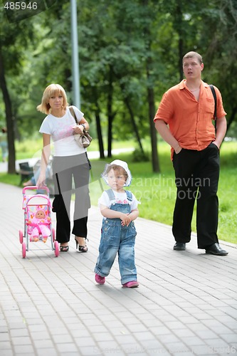 Image of family on walk in summer park