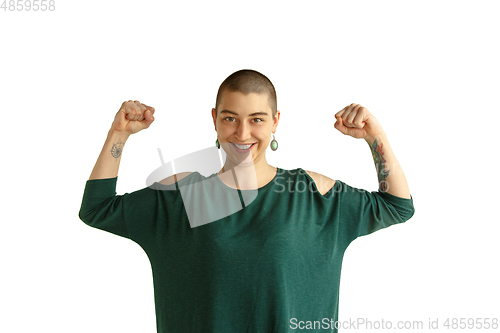 Image of Portrait of young woman with freaky appearance on white background