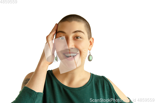 Image of Portrait of young woman with freaky appearance on white background