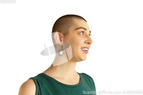 Image of Portrait of young woman with freaky appearance on white background