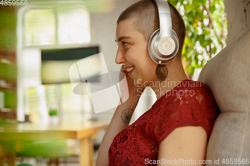 Image of Woman working from home during coronavirus or COVID-19 quarantine, remote office concept